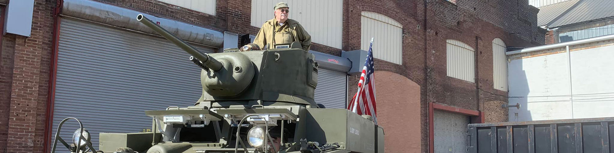 Bill Hartzel in M3A1 tank at the AC&F